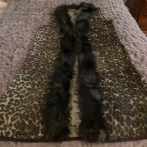 Knee legnth animal print vest with faux fur trim. Size L/XL